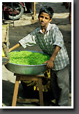 Boy offering Peas