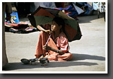 Girl selling Kitchen Utensils